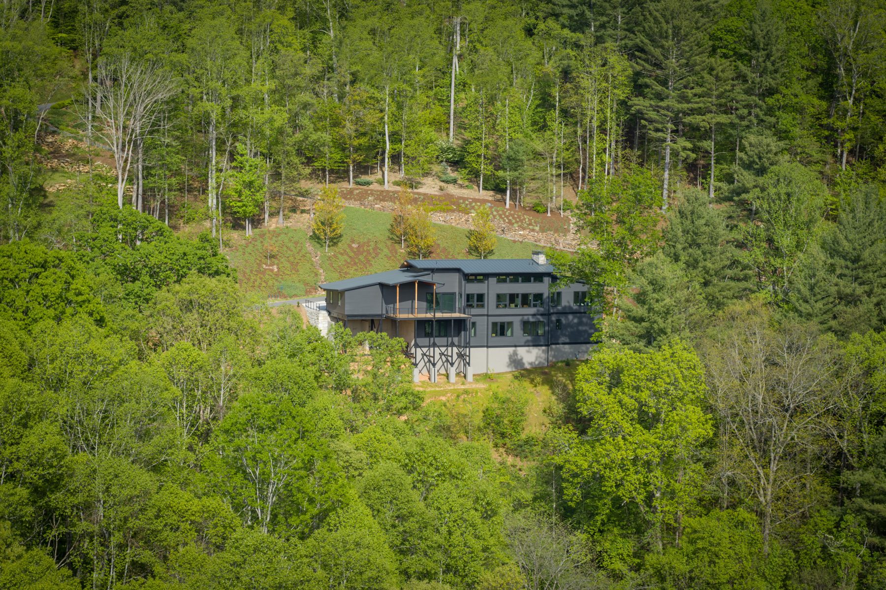 Modern Contemporary Asheville Home back of home by Osada Construction