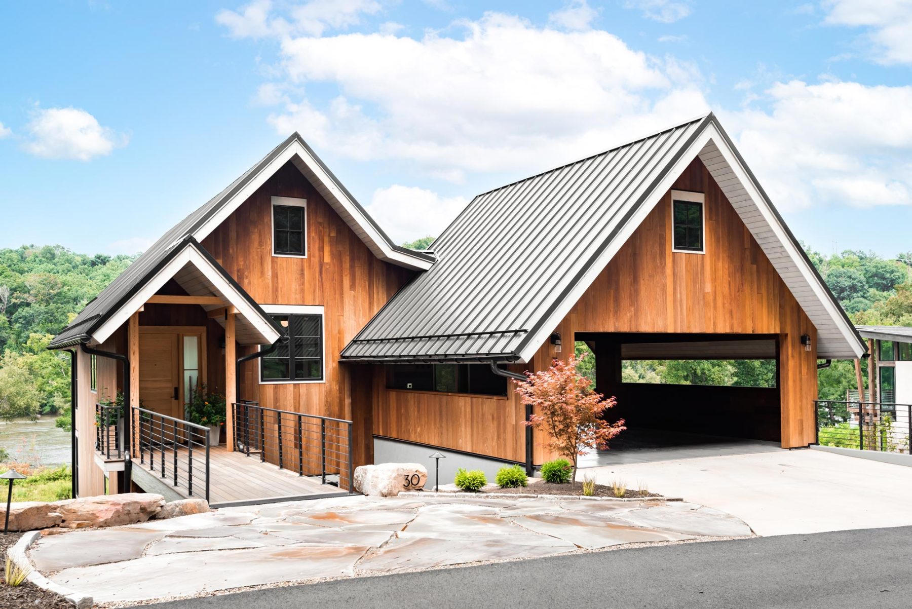 Olivette Custom Home Builder. A casual and cozy vibe fits perfectly with views overlooking the river in a sustainable community by Osada Construction.