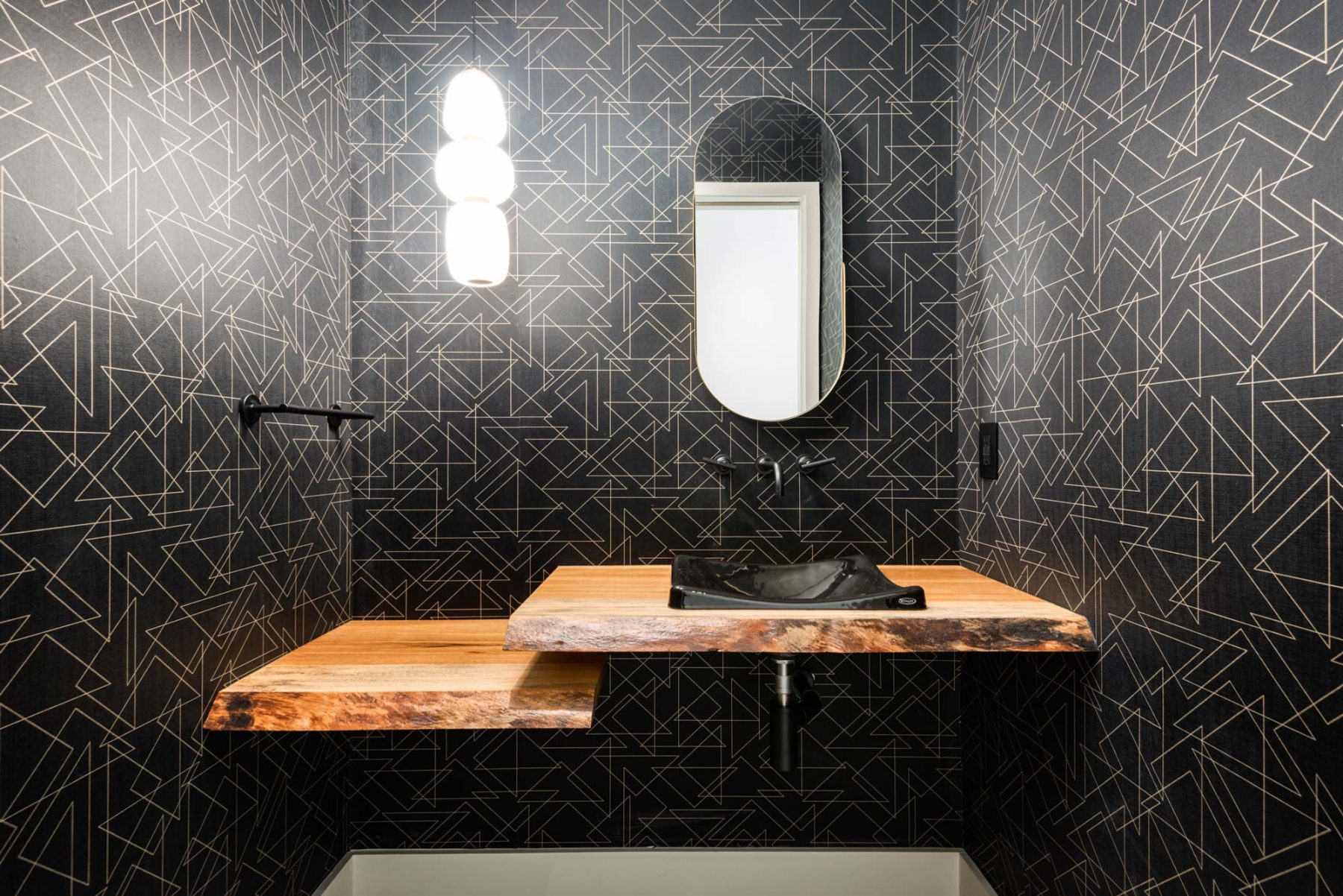 The Ramble Custom Home Builder powder room by Osada Construction