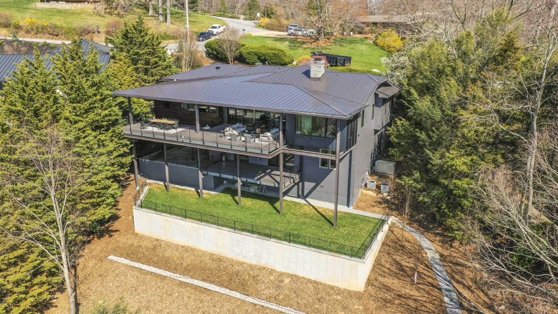 Modern Asheville Renovation after rear elevation by Osada Construction