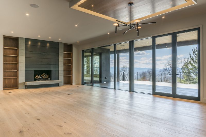 Modern Asheville Renovation after unfurnished living room by Osada Construction