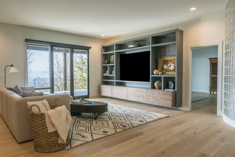 Modern Asheville Renovation after lower level family room by Osada Construction