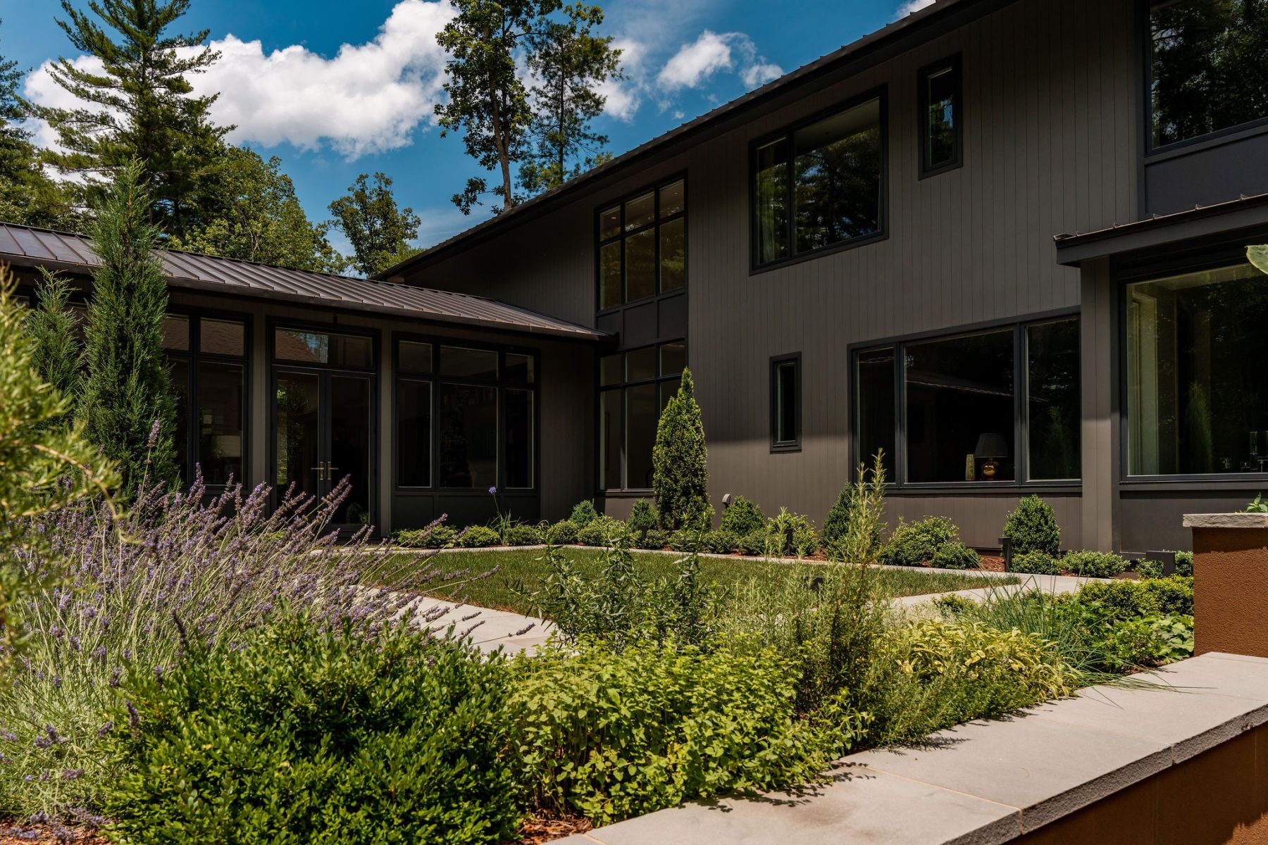 curated custom home the ramble garden