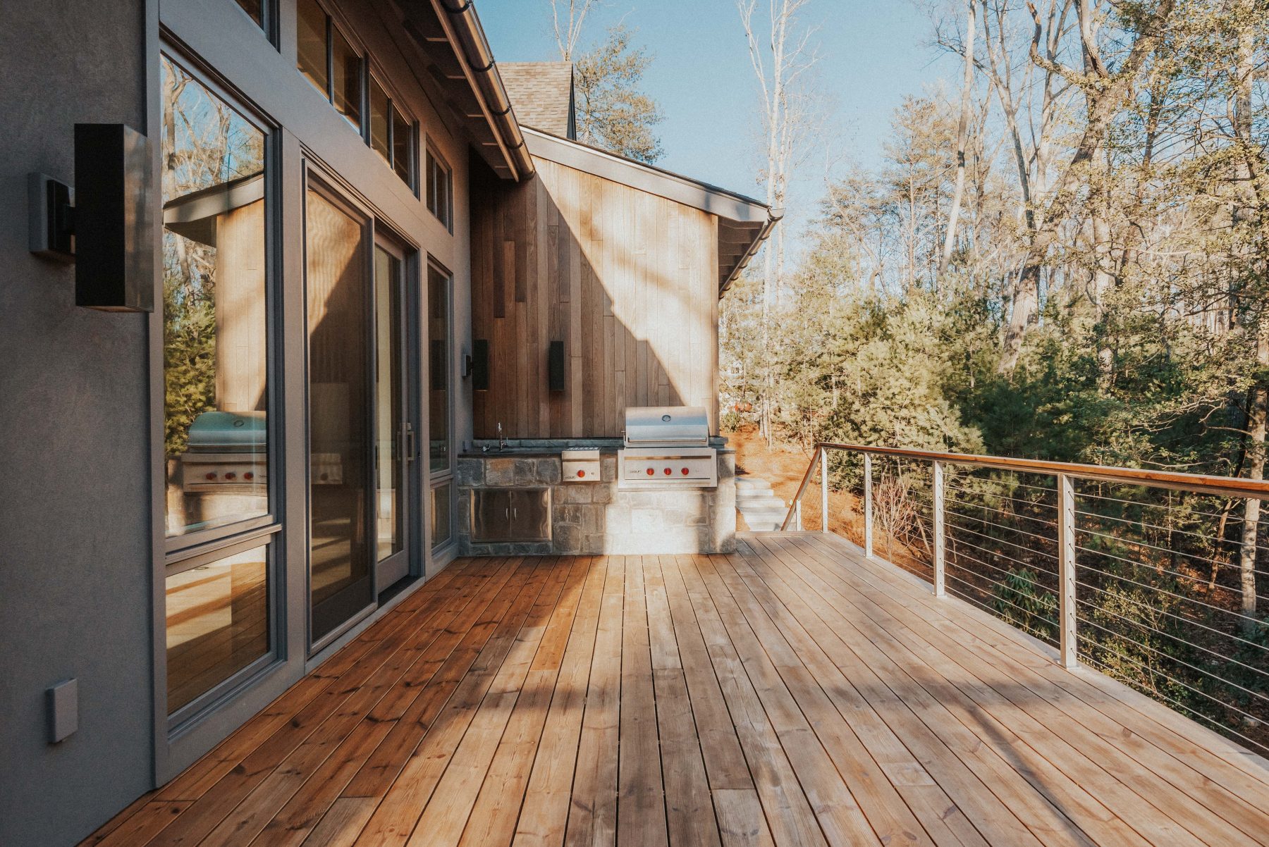 Asheville Builders in The Ramble screen in deck by Osada Construction